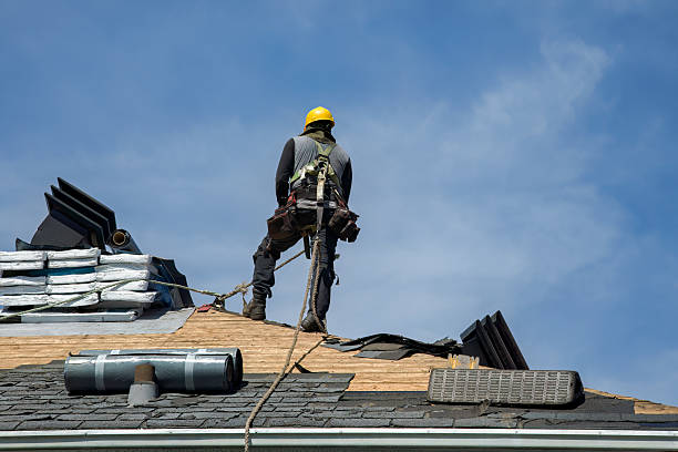 Professional Roofing technician working in Mill City, OR